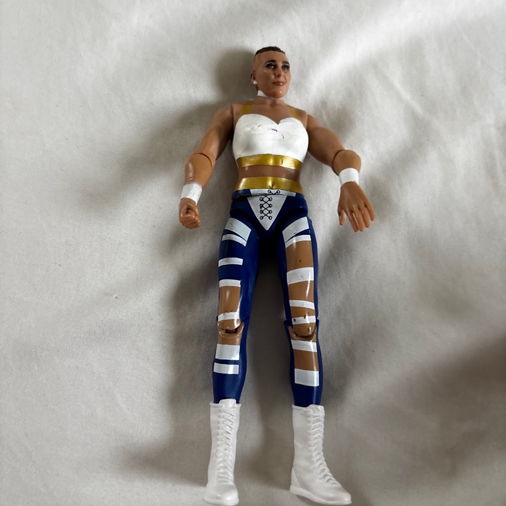 Wrestling Action Figure with Blue and Gold Outfit